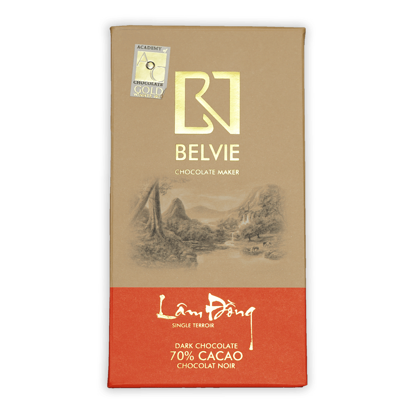 Belvie Lam Dong 70% dark chocolate bar with beige orange landscape wrapper