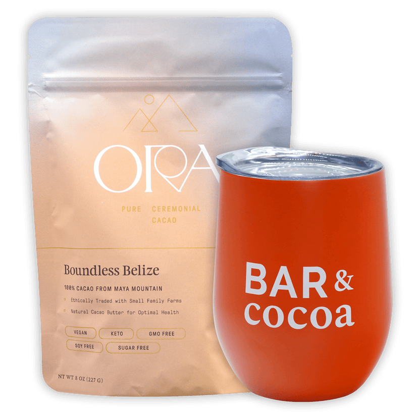 Vibrant orange insulated wine tumbler with clear lid and Bar & Cocoa lettering in Drinking Chocolate Gift Bundle