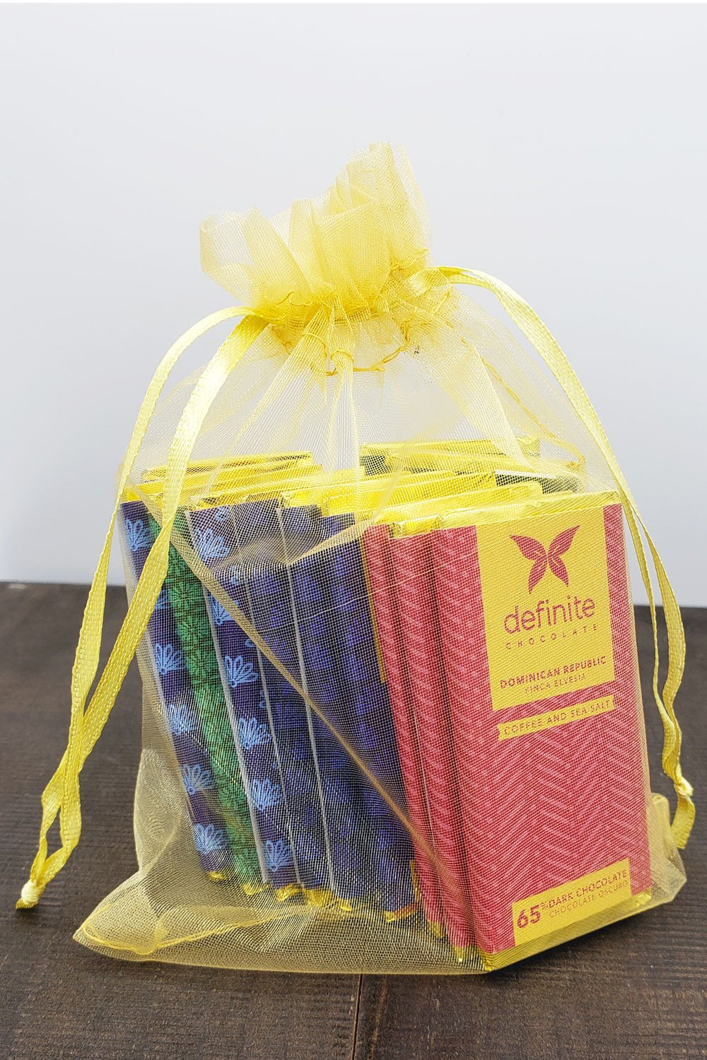 Definite Chocolate Mini Bar Variety Bag with 12 colorful minis in yellow organza bag