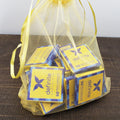 Yellow sheer organza bag with Definite Chocolate 50% milk Napolitans