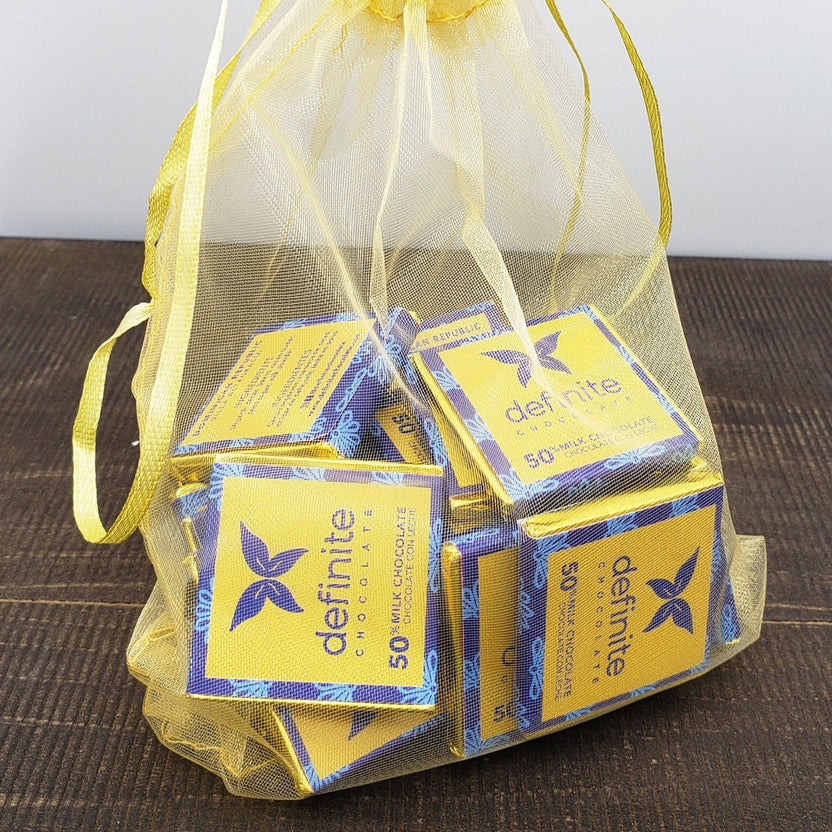 Yellow sheer organza bag with Definite Chocolate 50% milk Napolitans