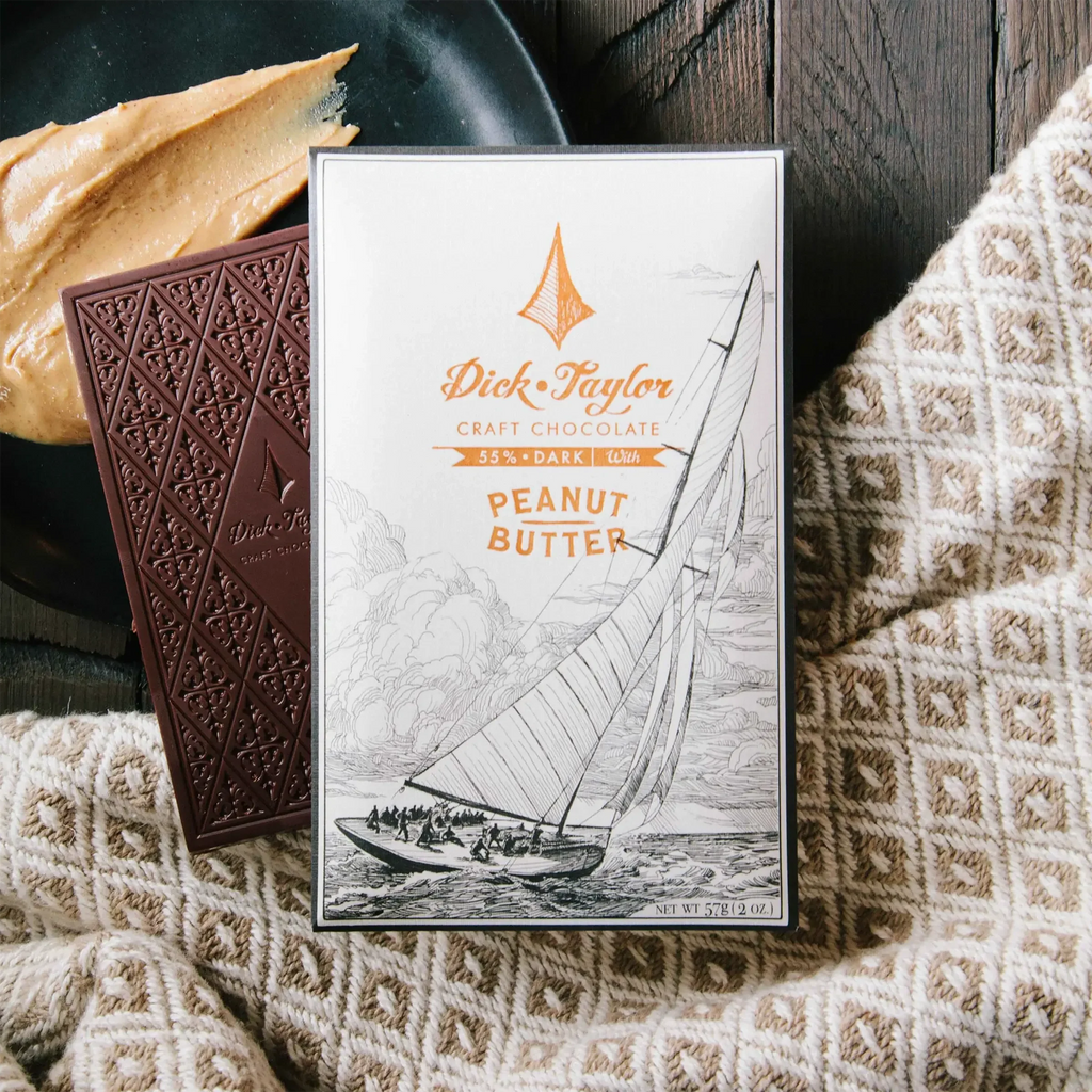 Dick Taylor 58% dark chocolate peanut butter bar with sailboat wrapper