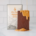 Dick Taylor Chocolate Peanut Butter 55% bar with diamond pattern and PB drizzle