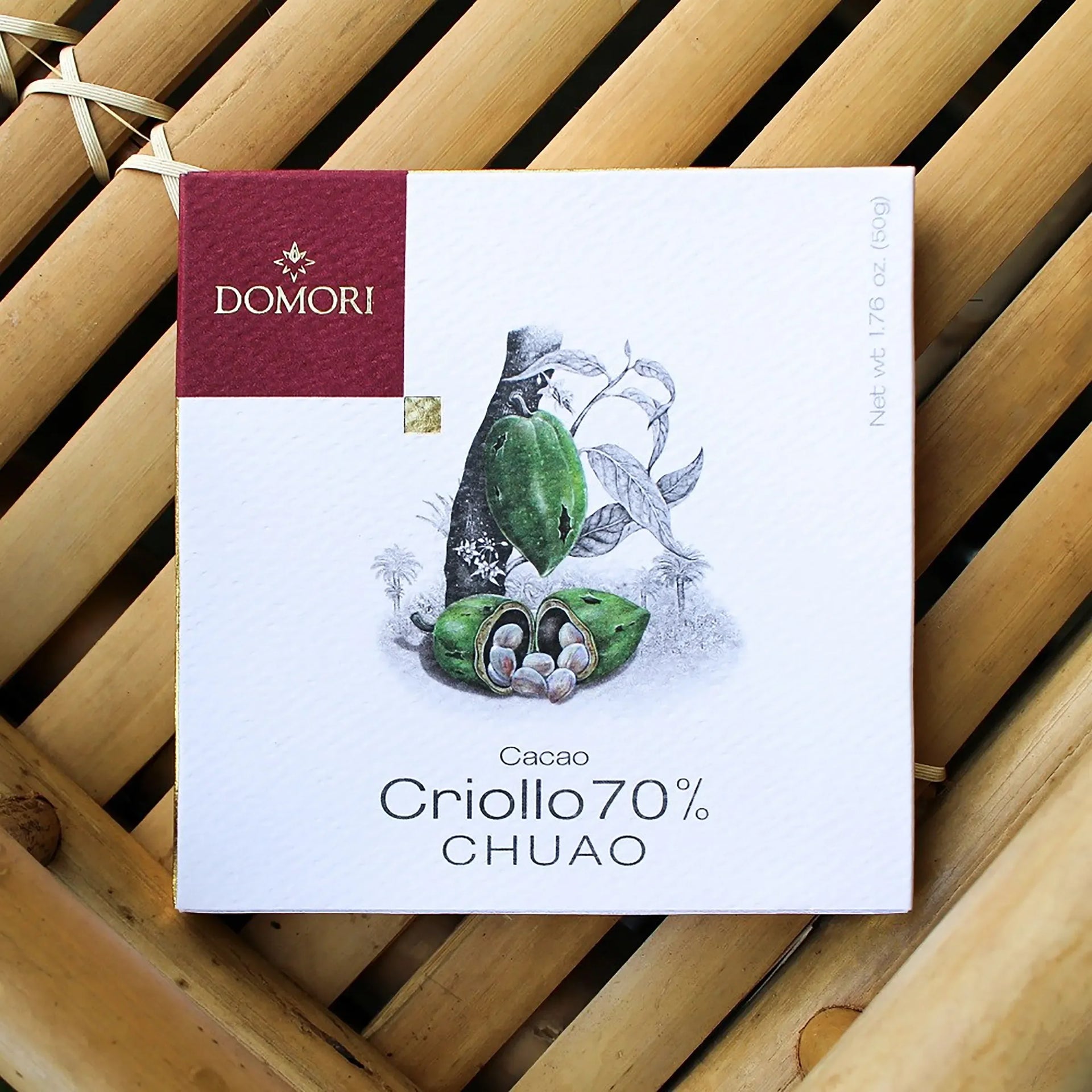 Domori Chuao Criollo 70% white maroon box with green cacao pods