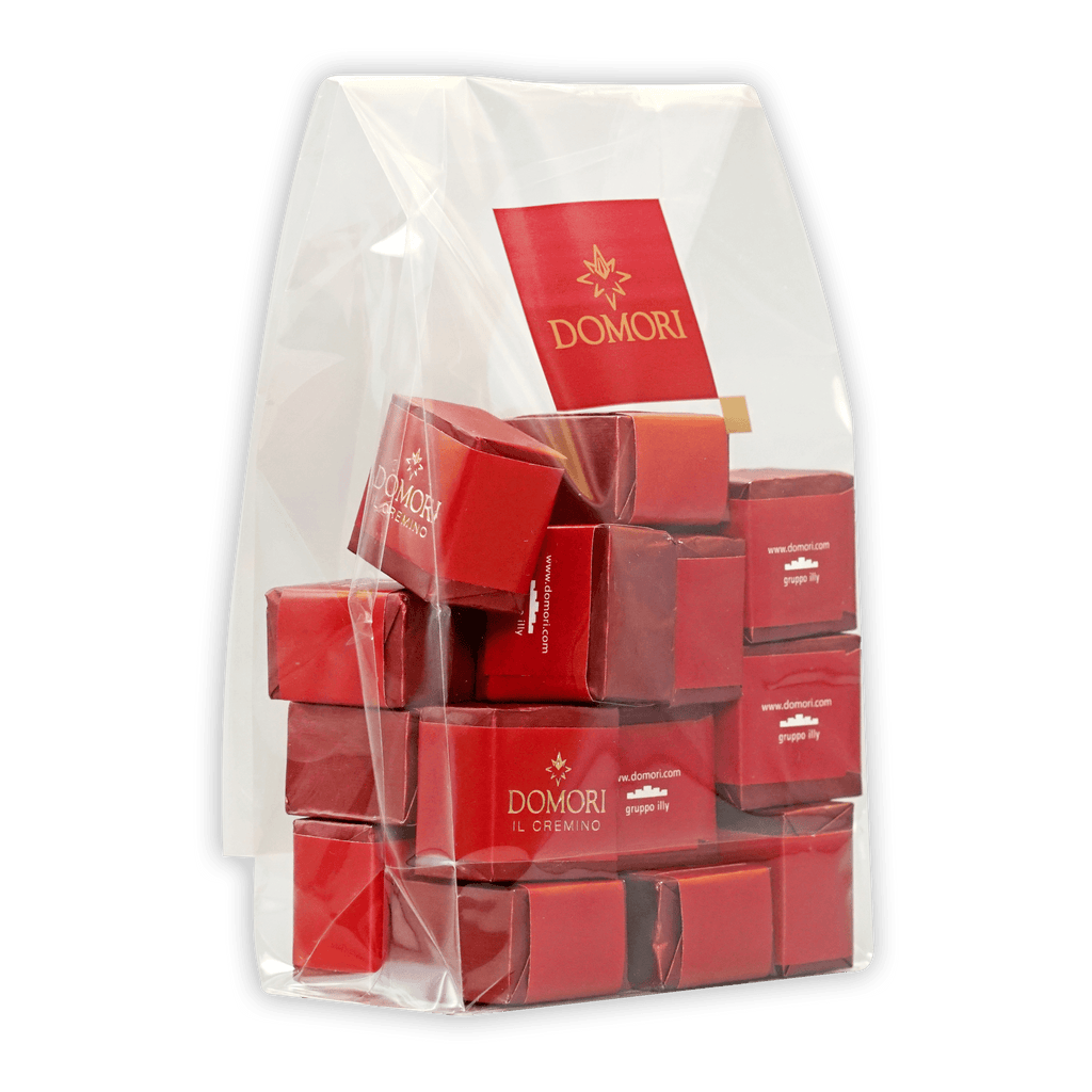 Red Domori gianduja cremino chocolate cubes in clear bag