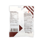 Illy white and brown striped package of Domori Dragees chocolate-covered coffee beans