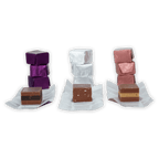 Three stacks of Guido Gobino Bulk Cremino fudge in colorful foil wrappers