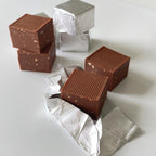 Guido Gobino Sea Salt Cremino Bag: square ribbed chocolates with nuts in silver foil