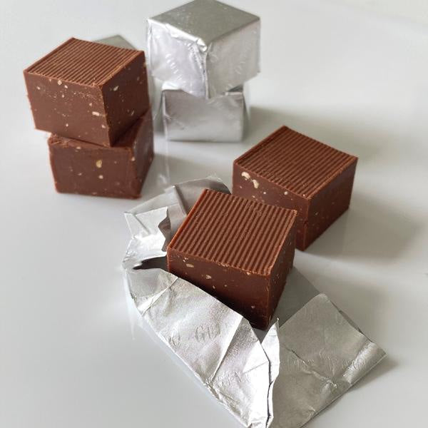 Guido Gobino Sea Salt Cremino Bag: square ribbed chocolates with nuts in silver foil