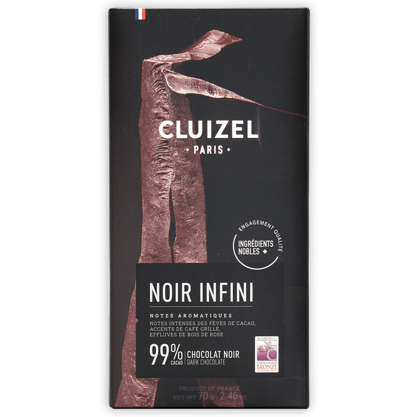 Michel Cluizel Noir Infini 99% dark chocolate bar with bronze figure