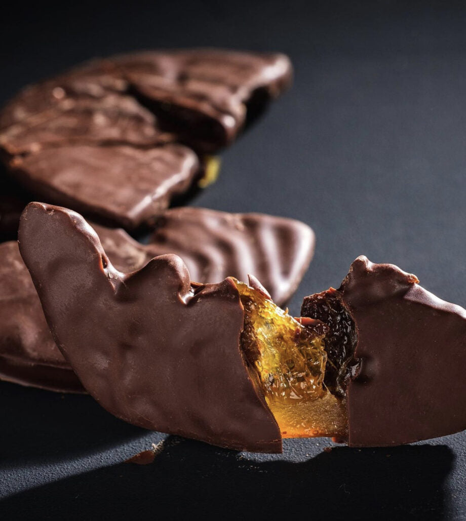 Mirzam Dark Chocolate Coated Oranges 62% with amber gelatin filling