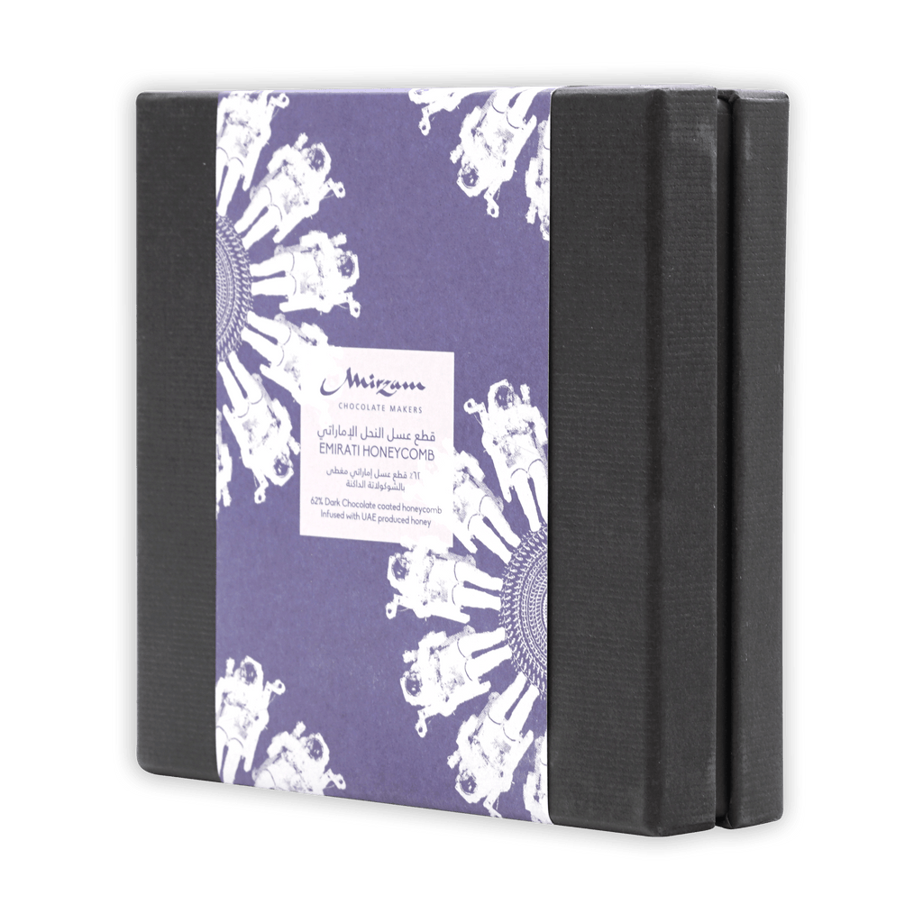 Mirzam Honeycomb in Dark Chocolate 62%: purple black box with white astronaut art