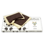 Omnom Cookies + Cream white chocolate bar with dark cookie pieces and fox logo