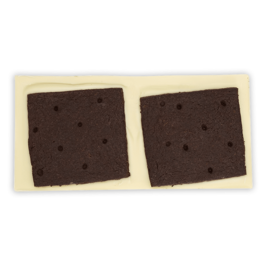 Omnom Cookies + Cream: two dark chocolate cookies with white centers in white tray