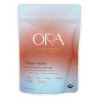 Ora Ceremonial Cacao Vibrant Vitality pouch with peach-to-blue gradient