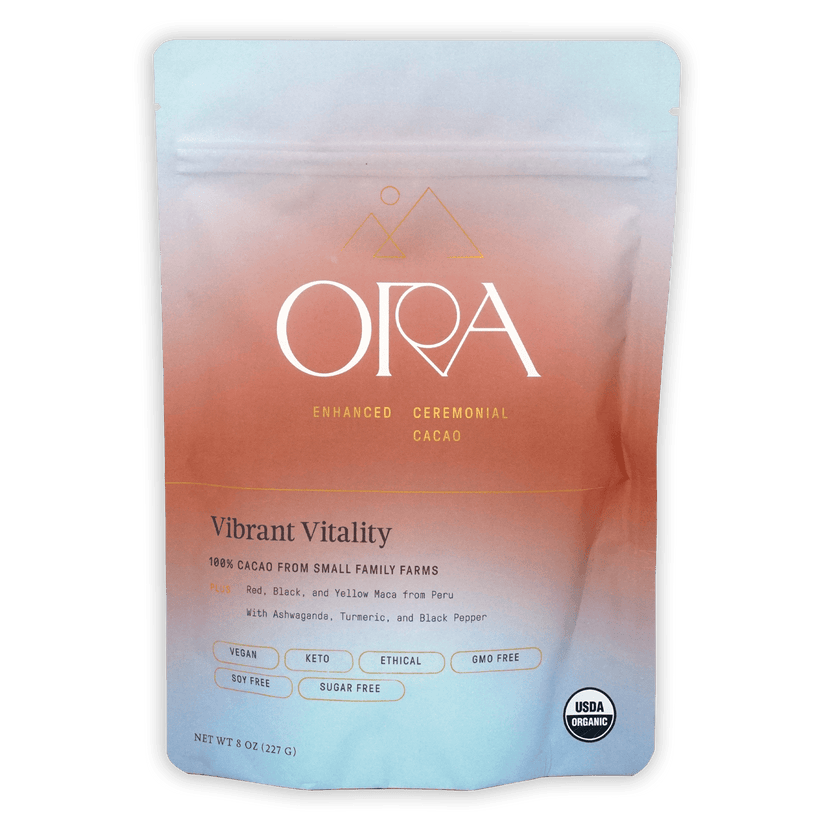 Ora Ceremonial Cacao Vibrant Vitality pouch with peach-to-blue gradient