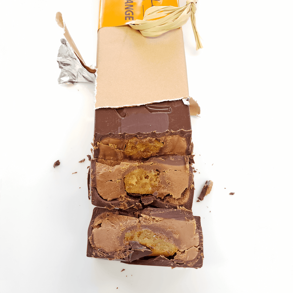 Pralus Infernale Orange Bar partially unwrapped with golden filling