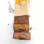 Pralus Infernale Orange Bar partially unwrapped with golden filling