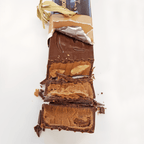 Pralus Infernale Noir Praline Bar with peanut butter filling and gold ribbon