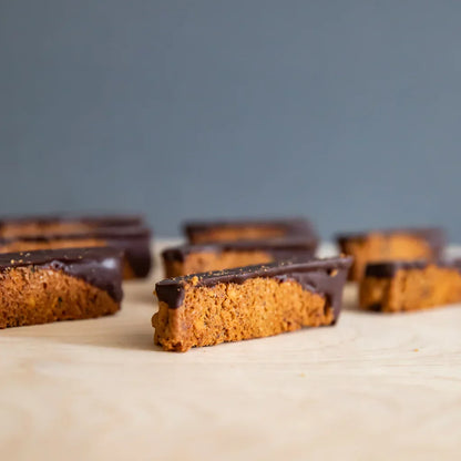 Golden-brown Ranger Chocolate Hazelnut Biscotti slices with dark chocolate coating