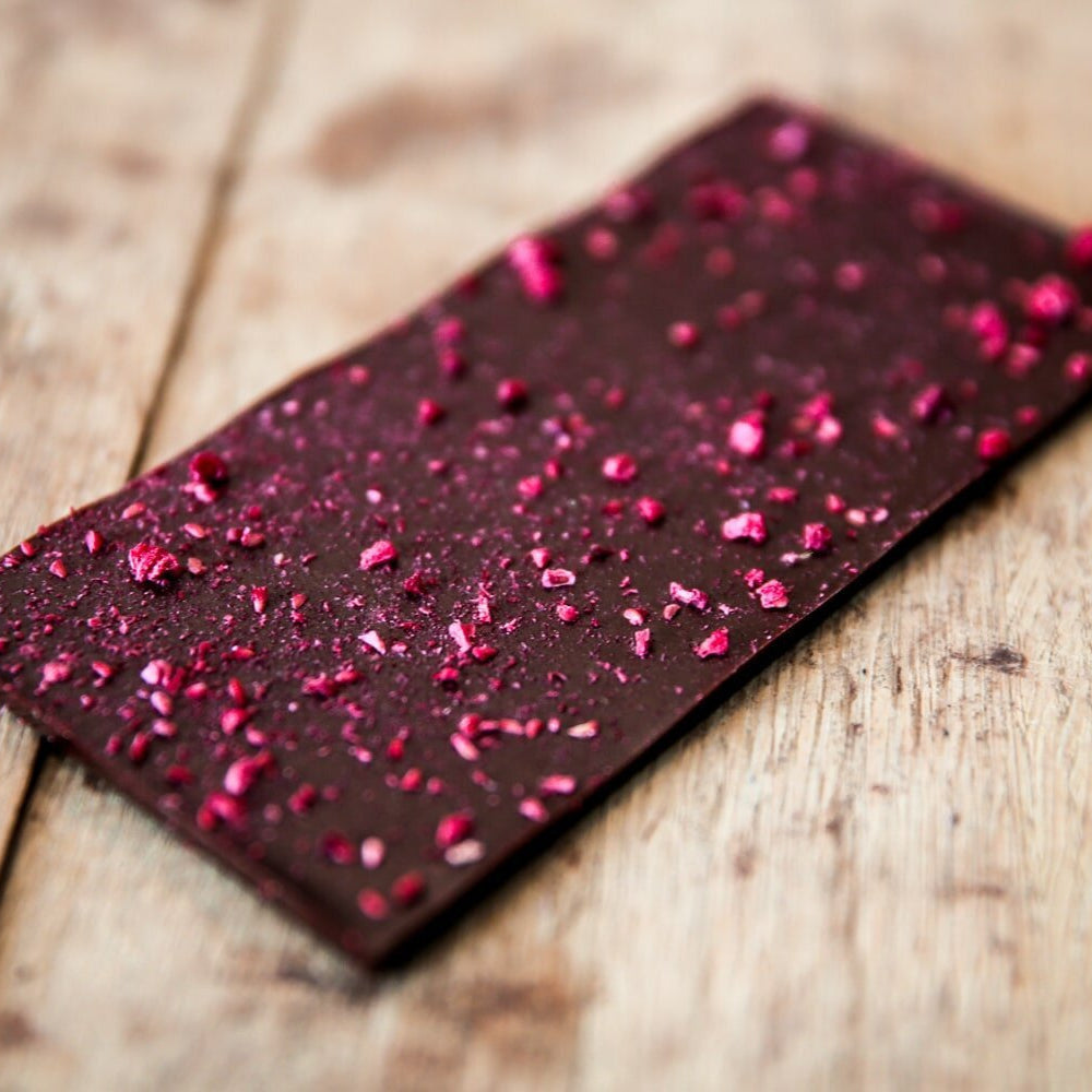 Ritual Après 70% dark chocolate bar with pink raspberry pieces