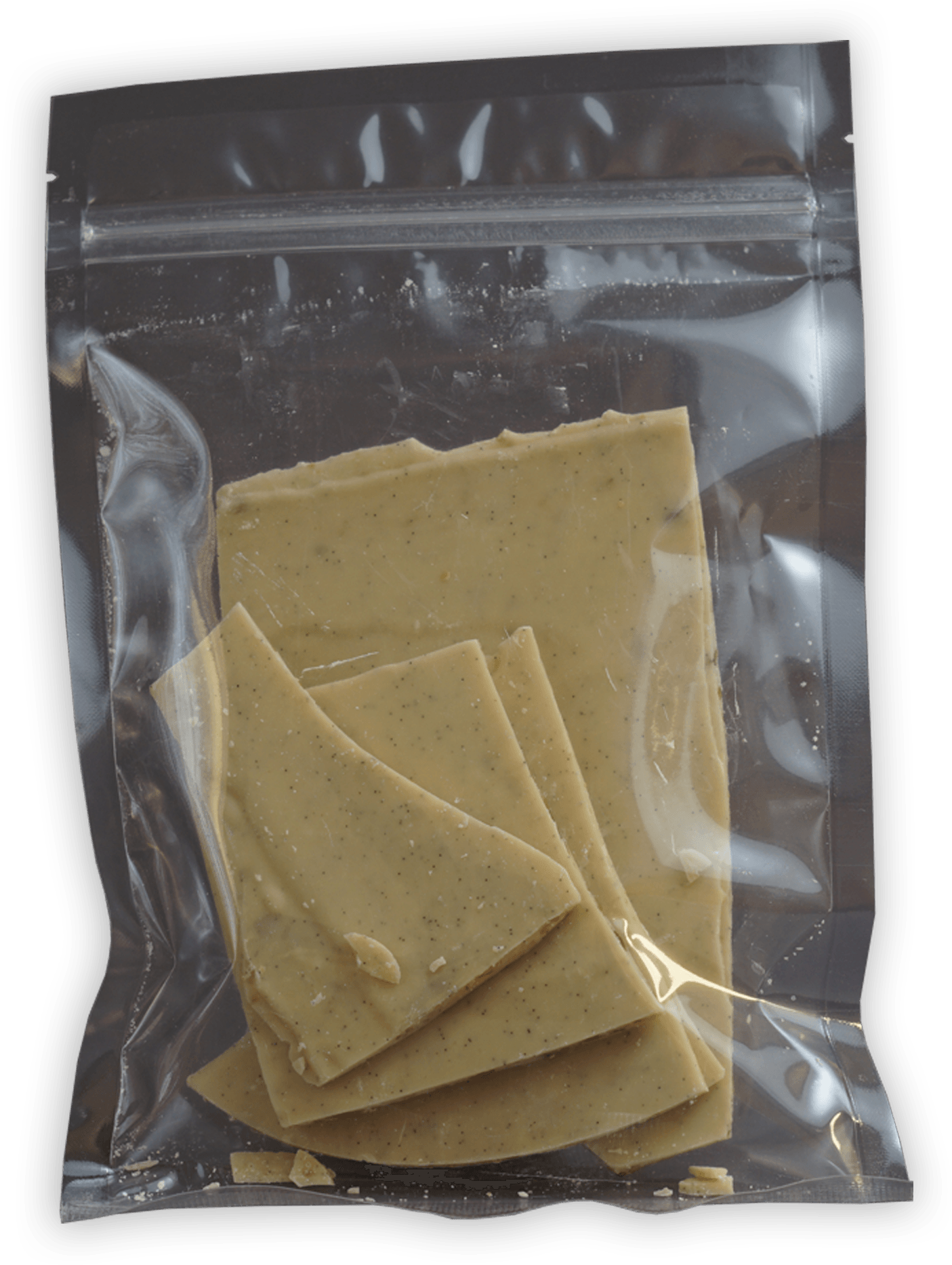 Soma Bark Crème Brûlée 125g: beige chocolate pieces with specks in clear bag
