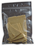 Soma Bark Crème Brûlée 125g: beige chocolate pieces with specks in clear bag