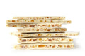 Stack of Soma Bark Crème Brûlée white chocolate bars with nuts and fruit, 125g