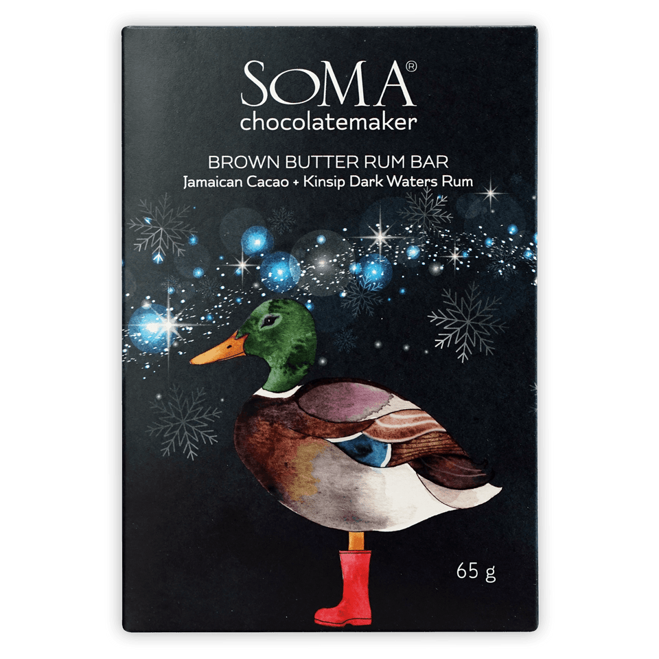 Soma Brown Butter Rum Bar with green-headed duck in red boots, snowflakes