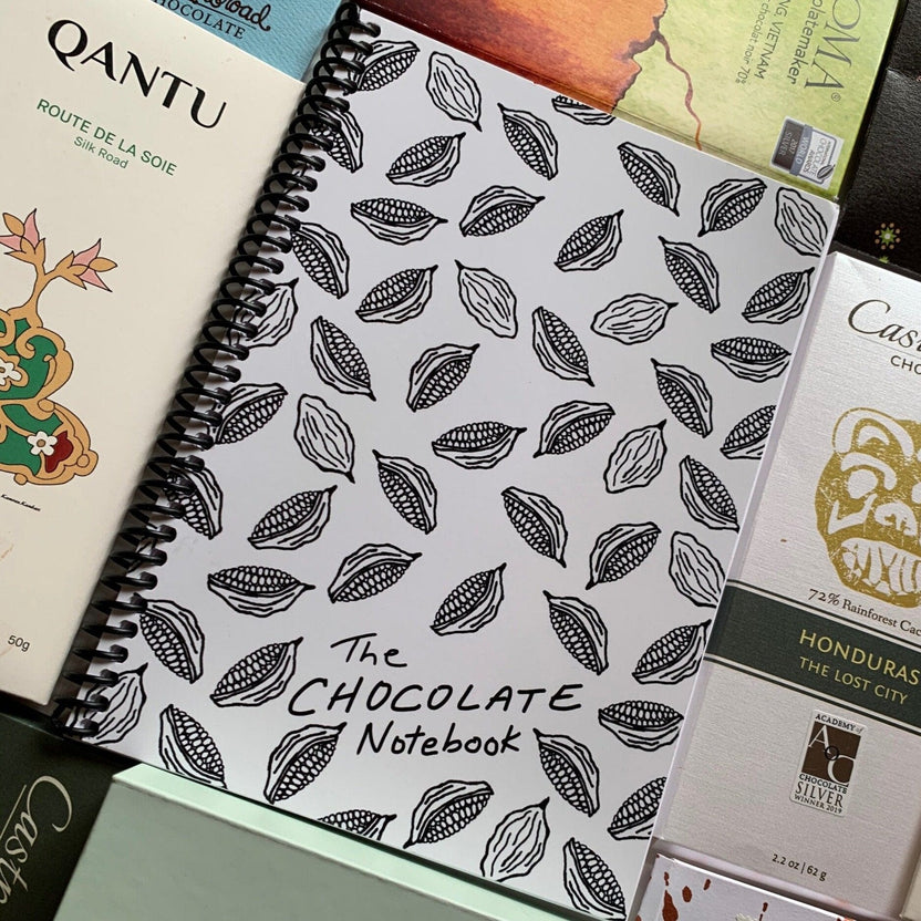 The Chocolate Notebook with cocoa pod line art on white cover