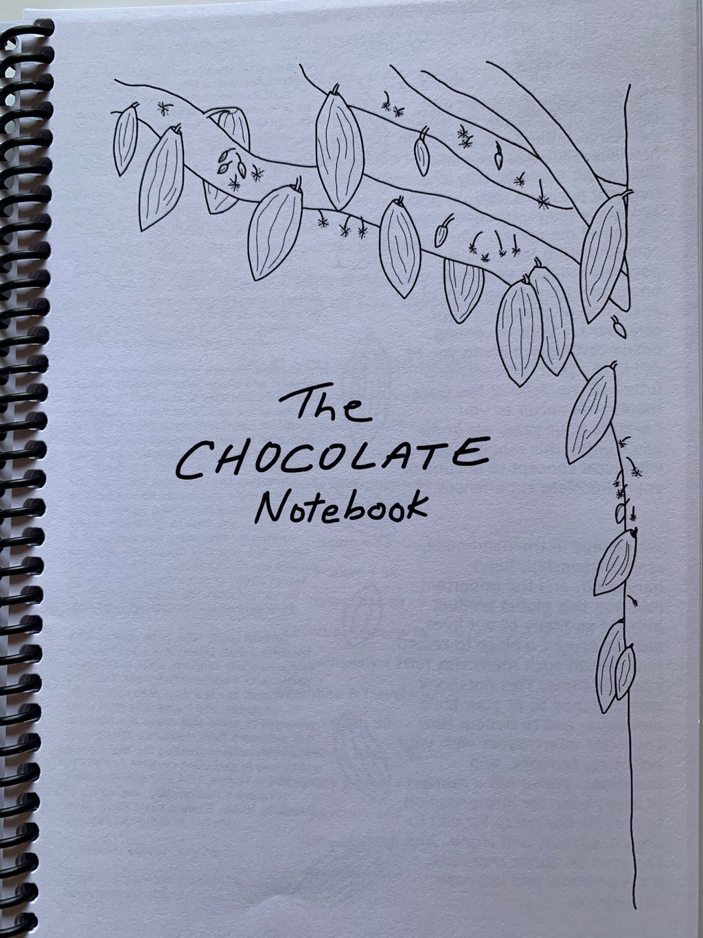 The Chocolate Notebook with cocoa pods cover art