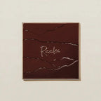 Raaka Vanilla Waffle Cone 61% dark brown chocolate bar with silver logo